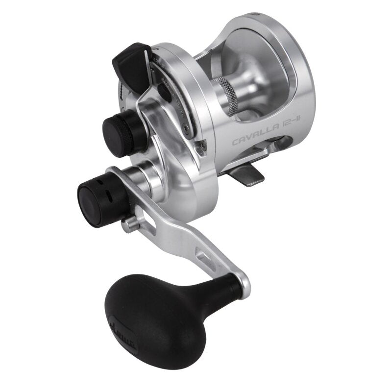 OKUMA Cavalla Lever Drag 12II RH fishing reel in silver with ergonomic black handle, dual drag system, and precision engineering.