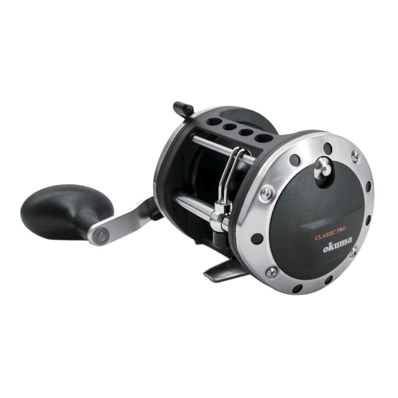 OKUMA Classic Pro XP Levelwind Star Drag 452LA fishing reel with durable metal construction, ergonomic handle, and smooth drag system.